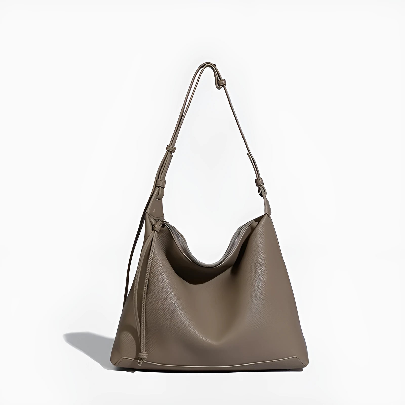 Large caramel coloured PU messenger bag with shoulder strap showing 36cm length