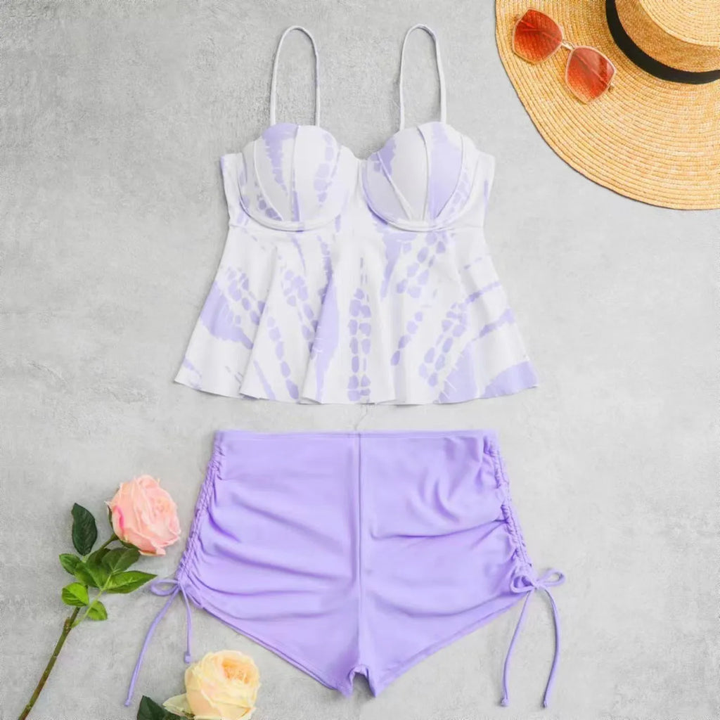 Women's printed split bikini swimsuit set showing top and shorts in blue colour option