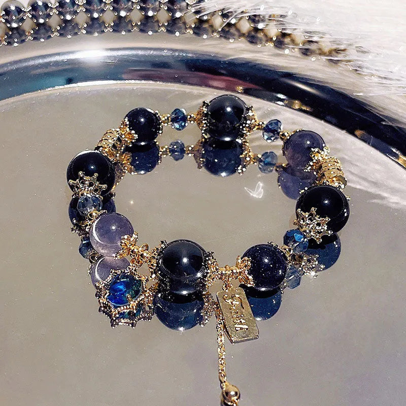 Women's galaxy-coloured alloy bracelet with heart shape and bow charms