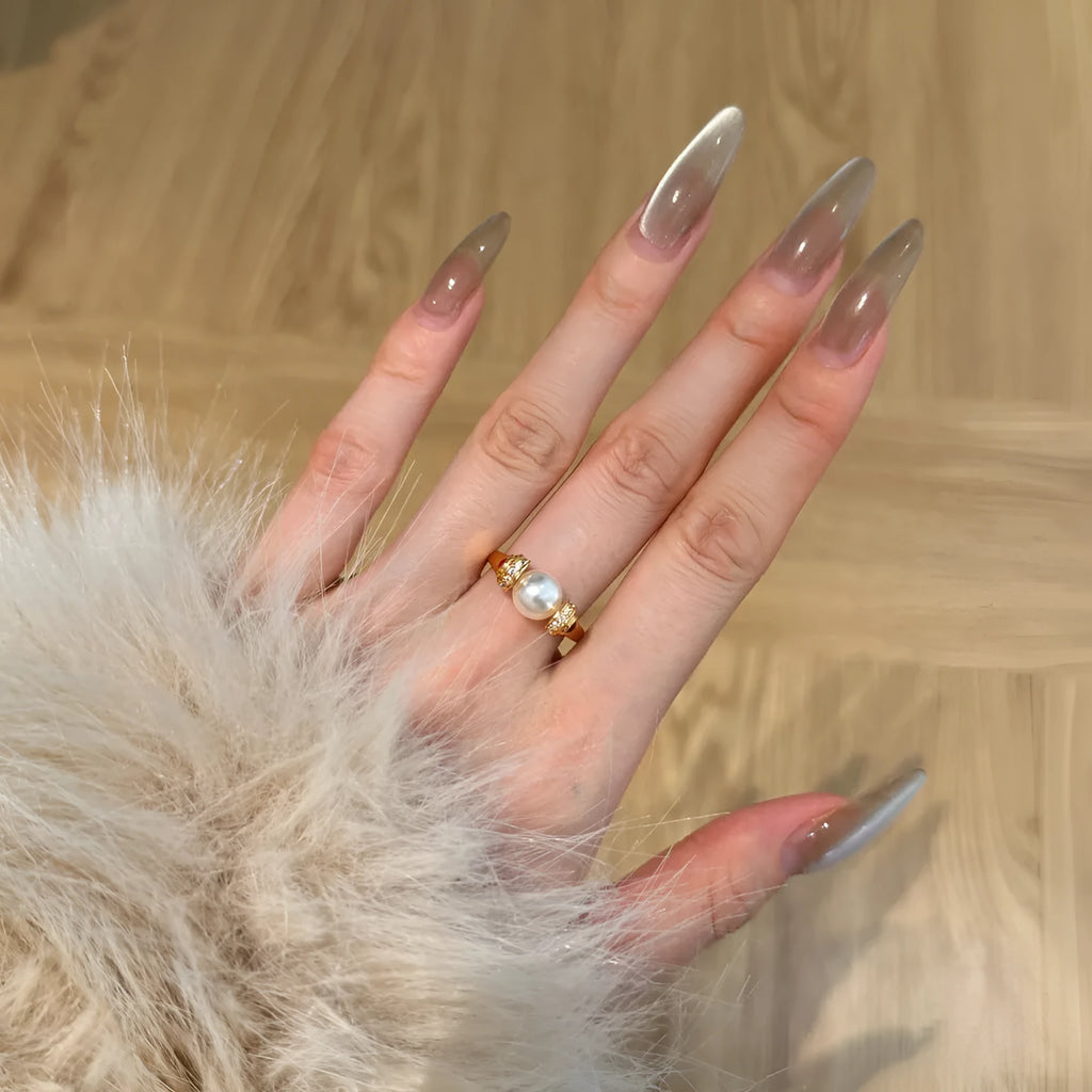 Gold colour silver female ring with geometric round pearl design, sizes 6, 7 and 8