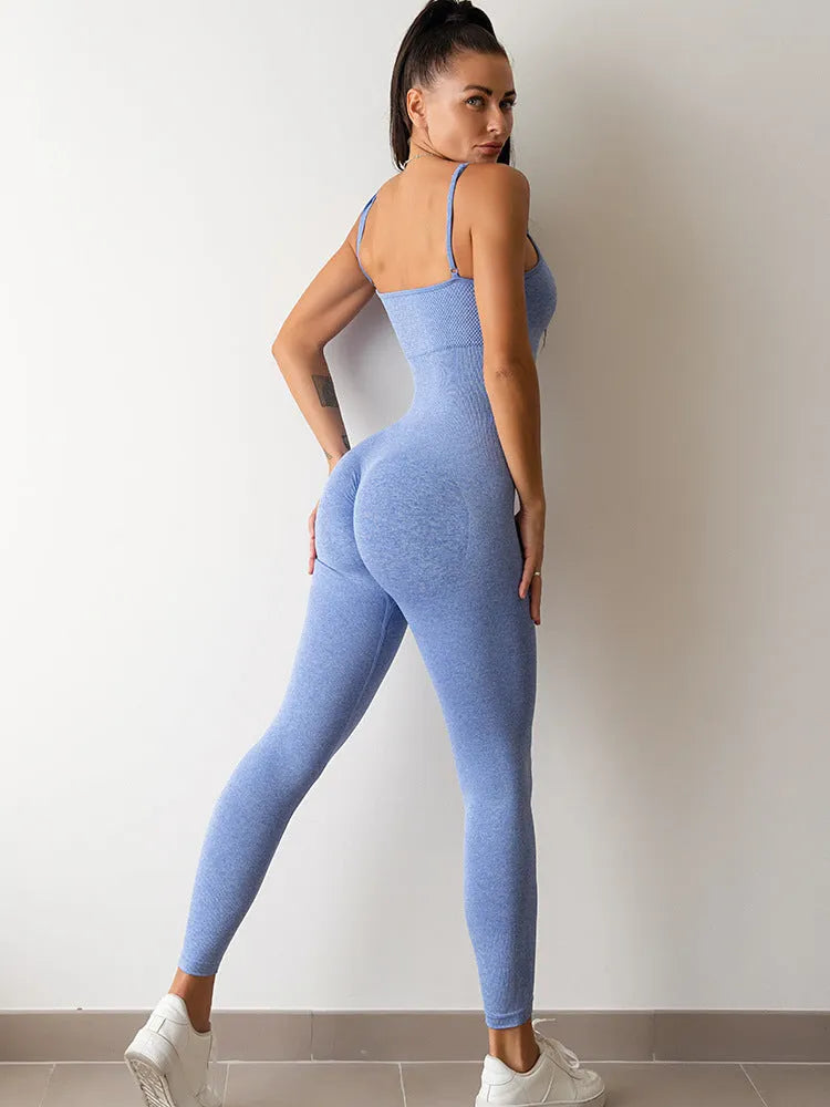 Women's black sleeveless unitard jumpsuit with spaghetti straps and a tight fit.