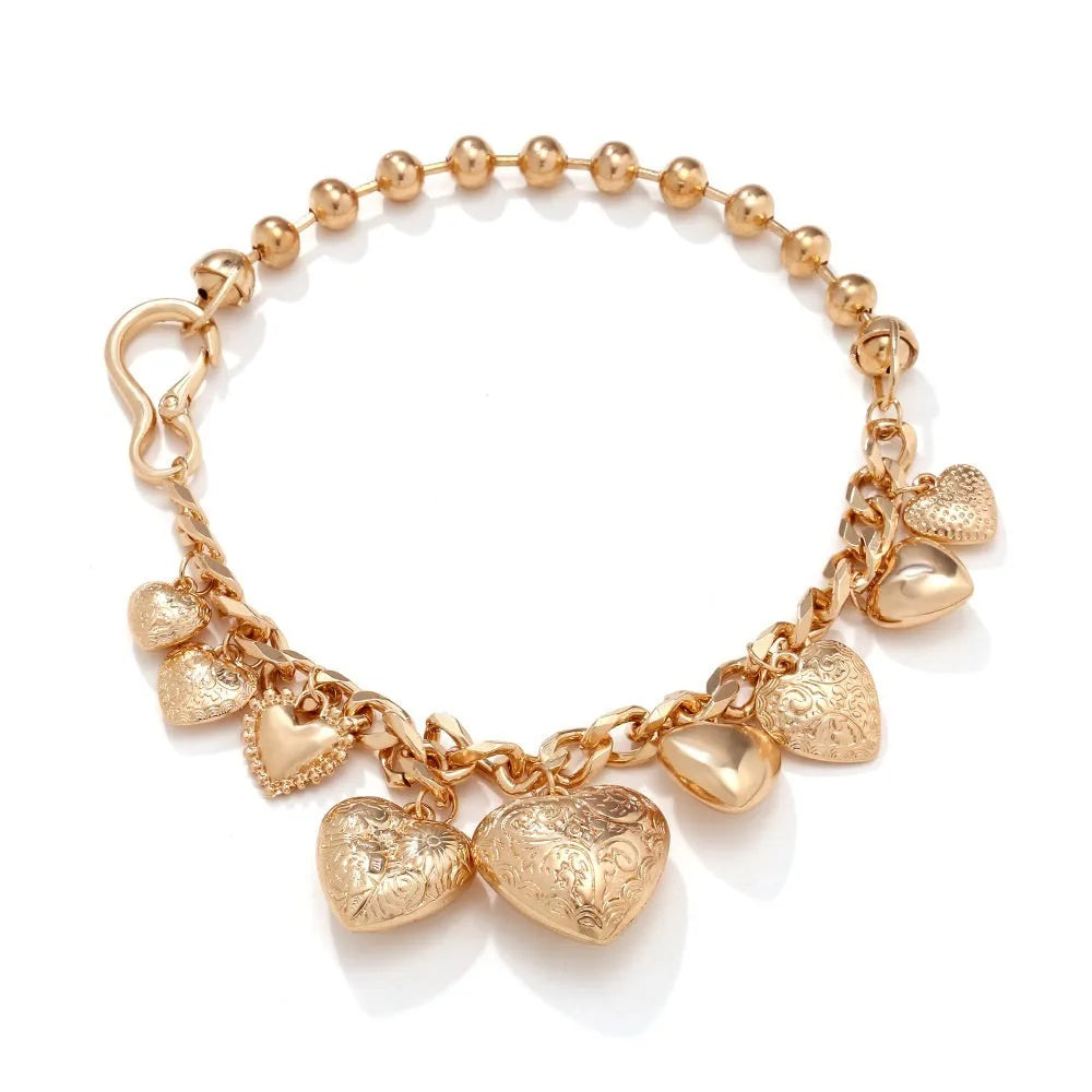 Exaggerated carved heart-shaped alloy pendant necklace on an adjustable metal chain.