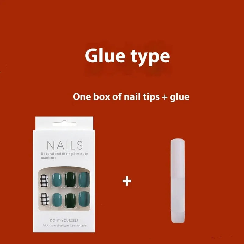 Short solid colour false nails in New Year red with marble pattern, 24 pieces per box with glue for ladies.