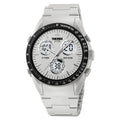 Unisex digital watch with camouflage strap, resin lens, and stainless steel button on a wrist.