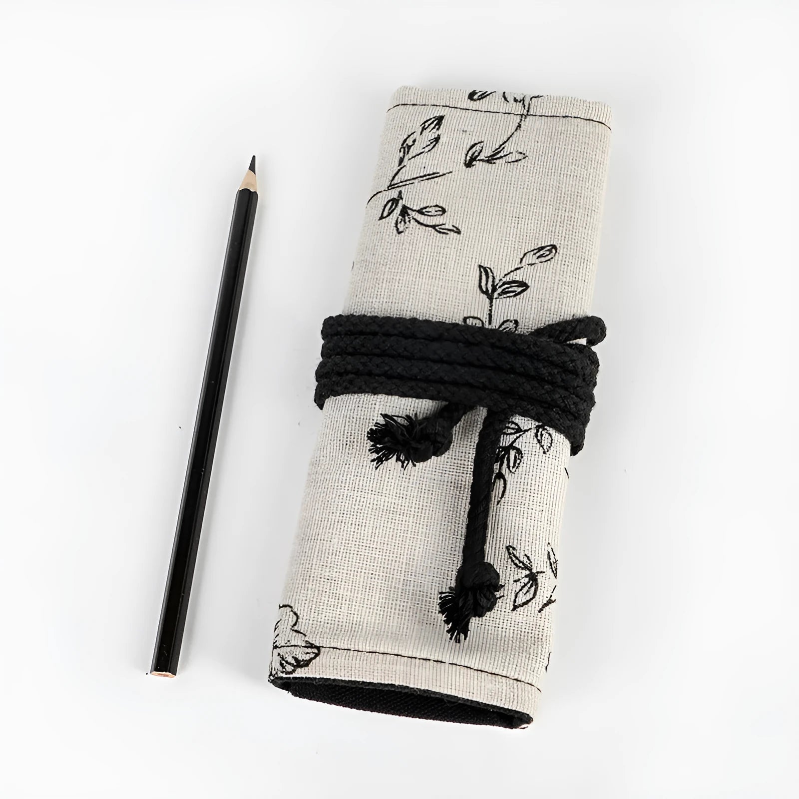 Black Peony floral print cotton hemp pencil roll bag, shown open with 24 holes.