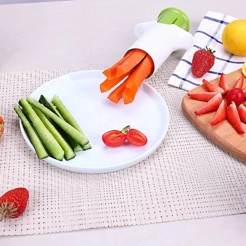 White vegetable cutter tool with six stainless steel blades for slicing cucumbers and carrots