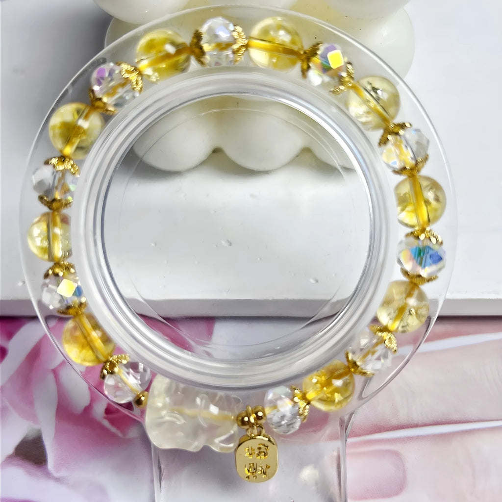 Women's crystal bracelet with a detailed nine-tail fox charm in natural citrine.