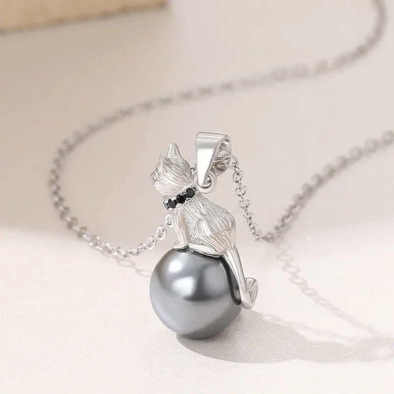925 sterling silver cat pendant necklace with electroplated finish, shown as single pendant and with chain