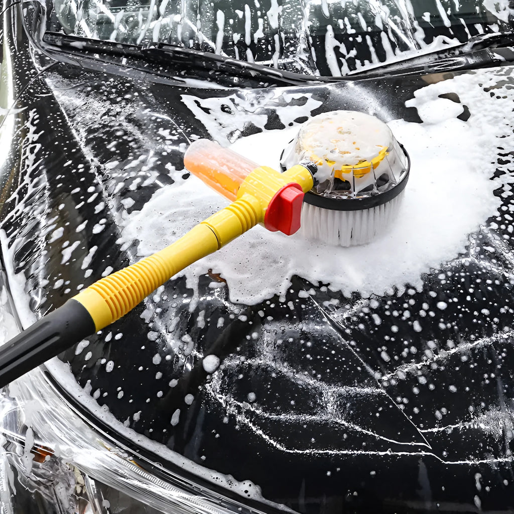 Yellow car wash mop cleaning tool with a long handle and chenille brush head.