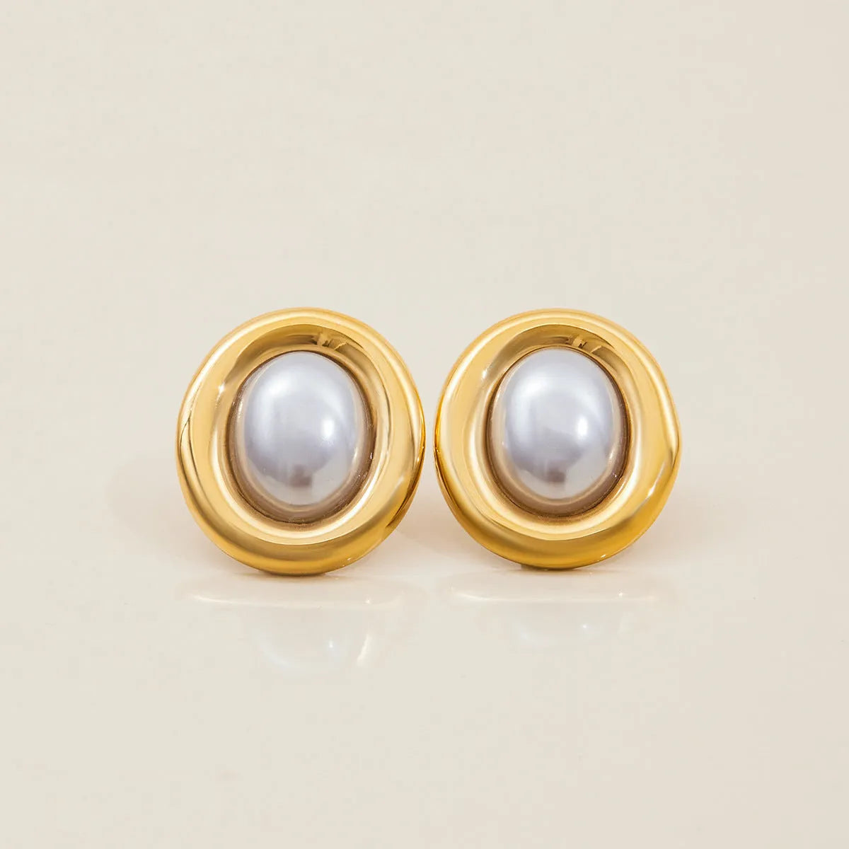 Stainless steel vintage pearl ear studs for women with silver tone finish and electroplated surface