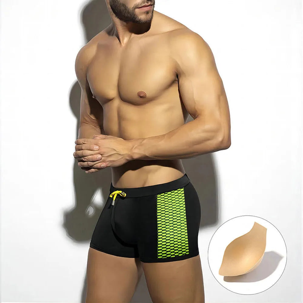 Men's polka dot print quick-dry swimming boxers in yellow, black, and dark blue.