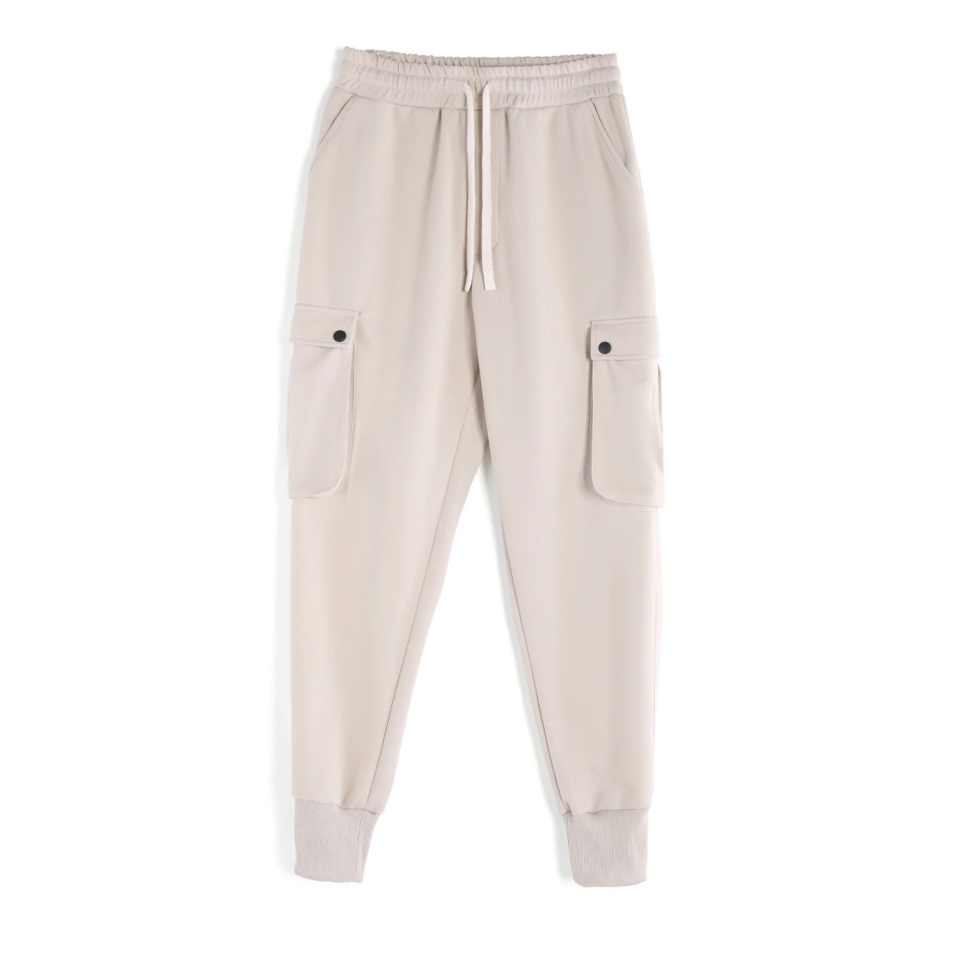 Men's loose-fit light grey cotton trousers with tapered legs and tied ankle cuffs, showing multi-pocket detail.