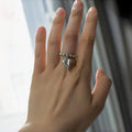 Handmade elastic beaded love ring with geometric heart design in gold and white electroplated finishes