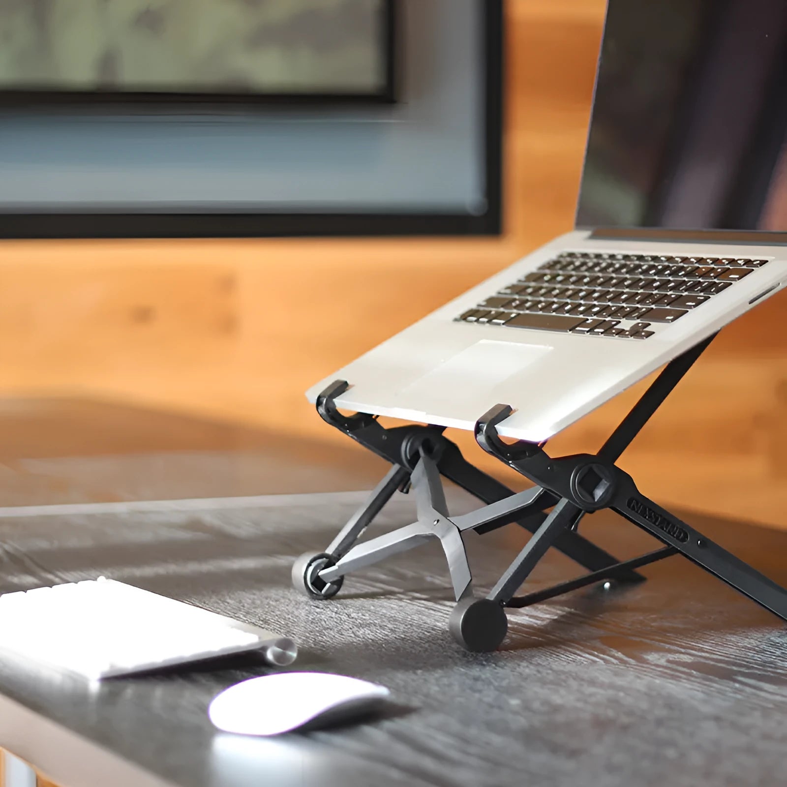 Black K2 portable foldable laptop stand made of enhanced nylon with carry bag.