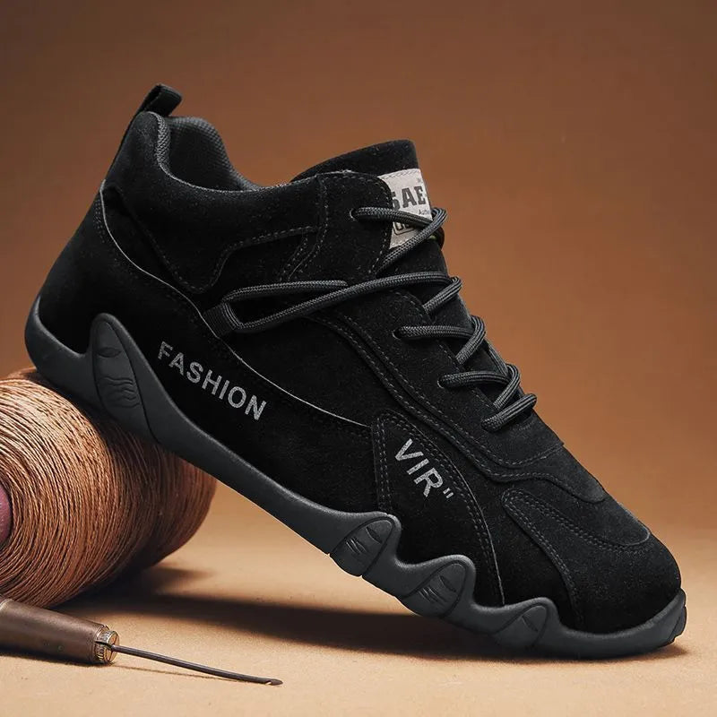 Men's grey low-cut casual shoes with elastic band and non-slip sole.