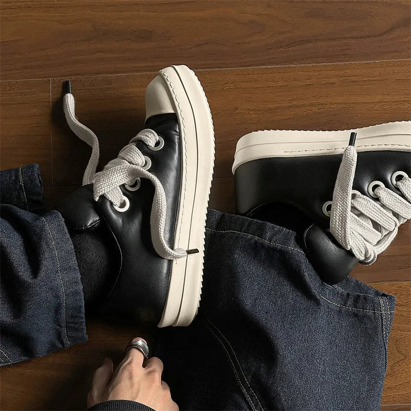 Black men's slip-on casual shoes with leather upper and rubber sole showing round toe and flat heel