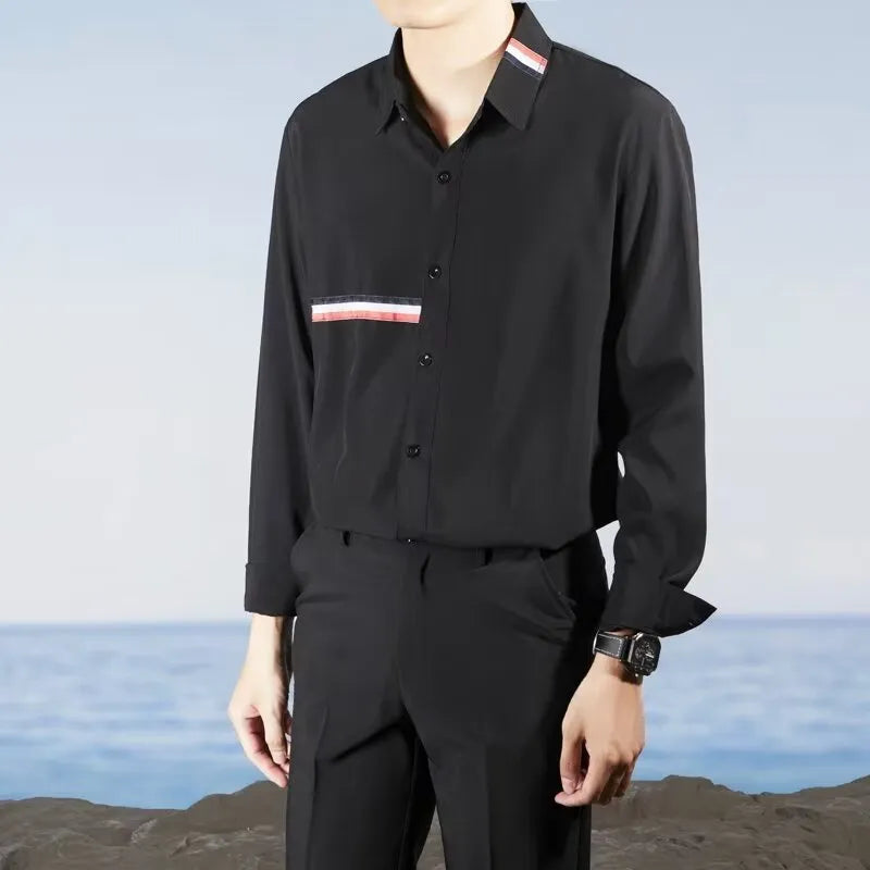Hong Kong style loose fit cotton blend shirt in light blue, showing cardigan design on a hanger.