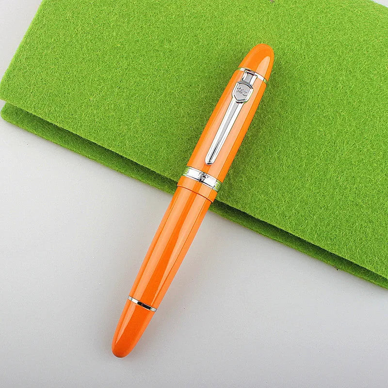 Metal ball pen with pearl round beads and black gold clip on white background