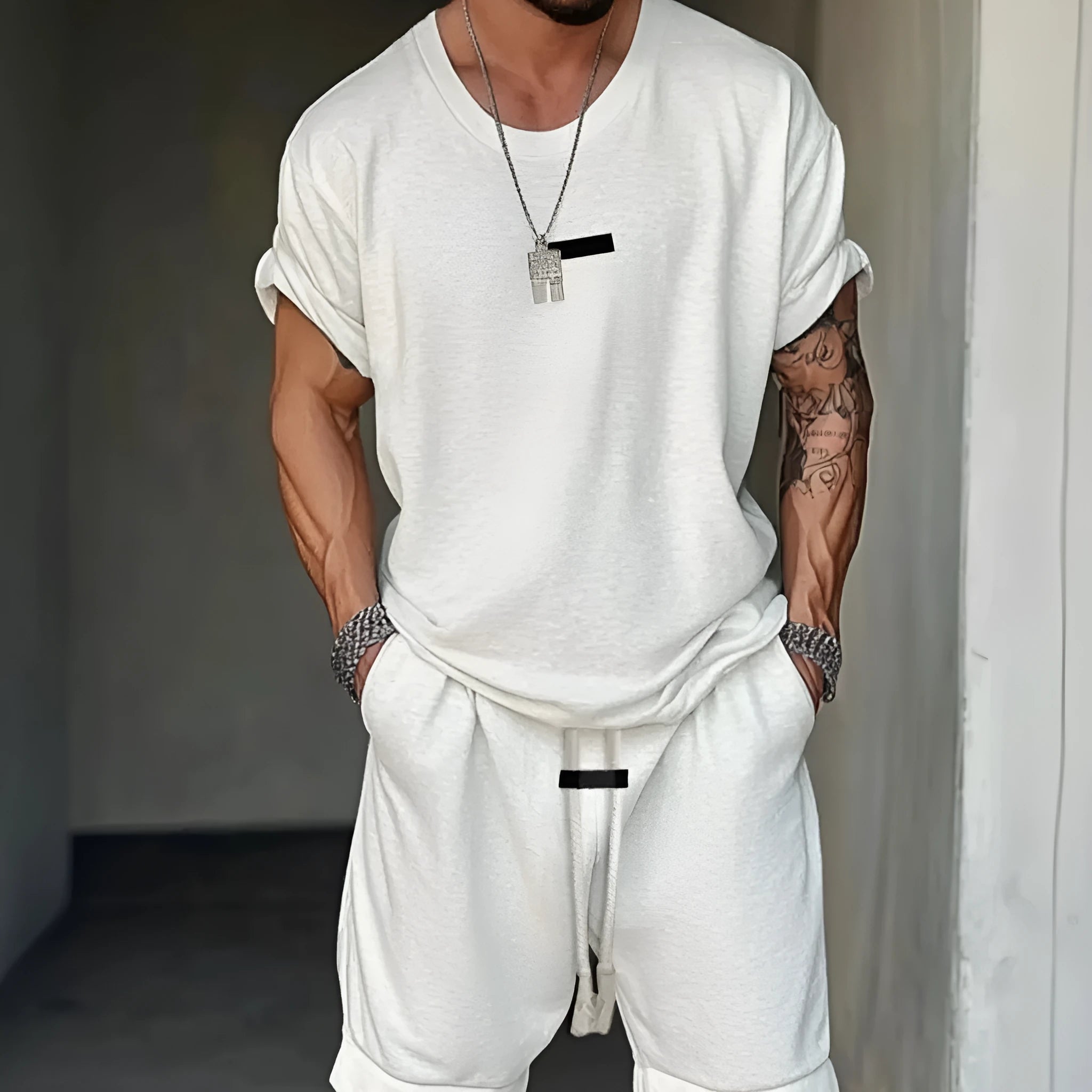Men's grey hip hop style t-shirt and shorts set with white letter printing on the chest.