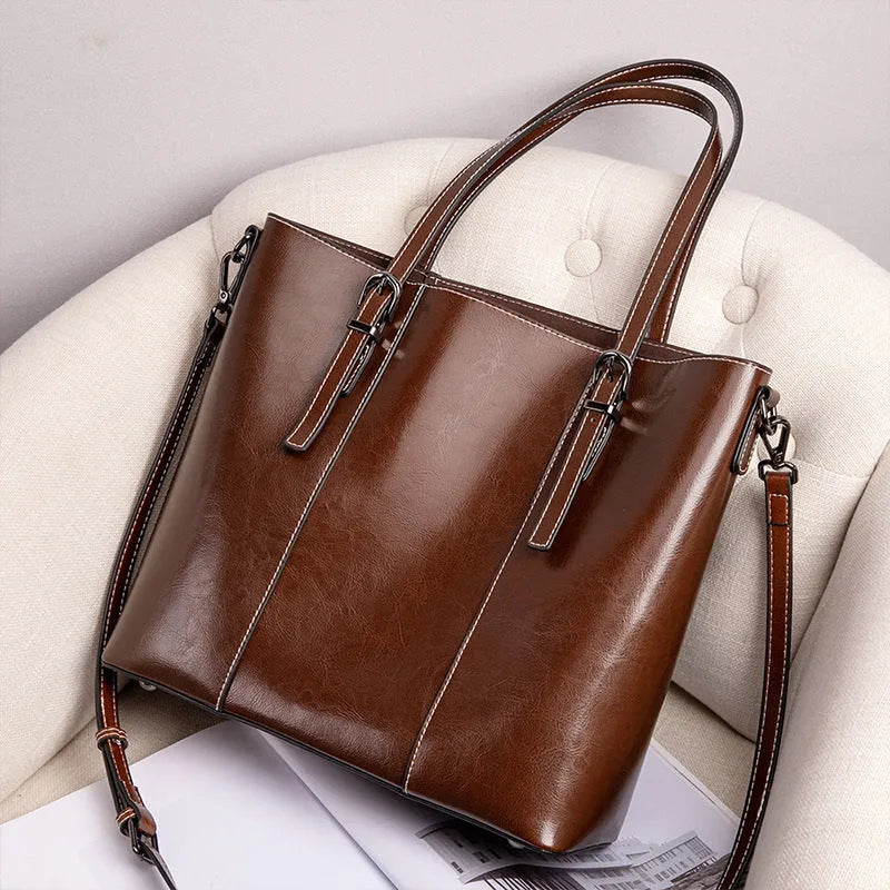 Brown genuine leather women's retro shoulder bag with three straps and multiple pockets