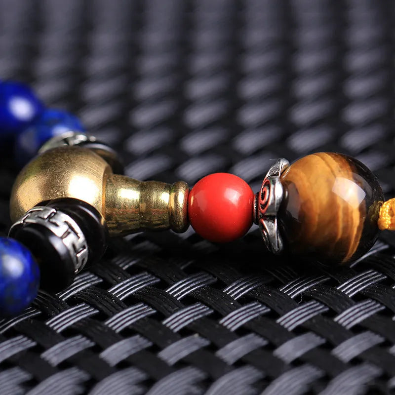 Natural lapis lazuli 108 bead bracelet with zodiac motifs in 6mm or 8mm sizes
