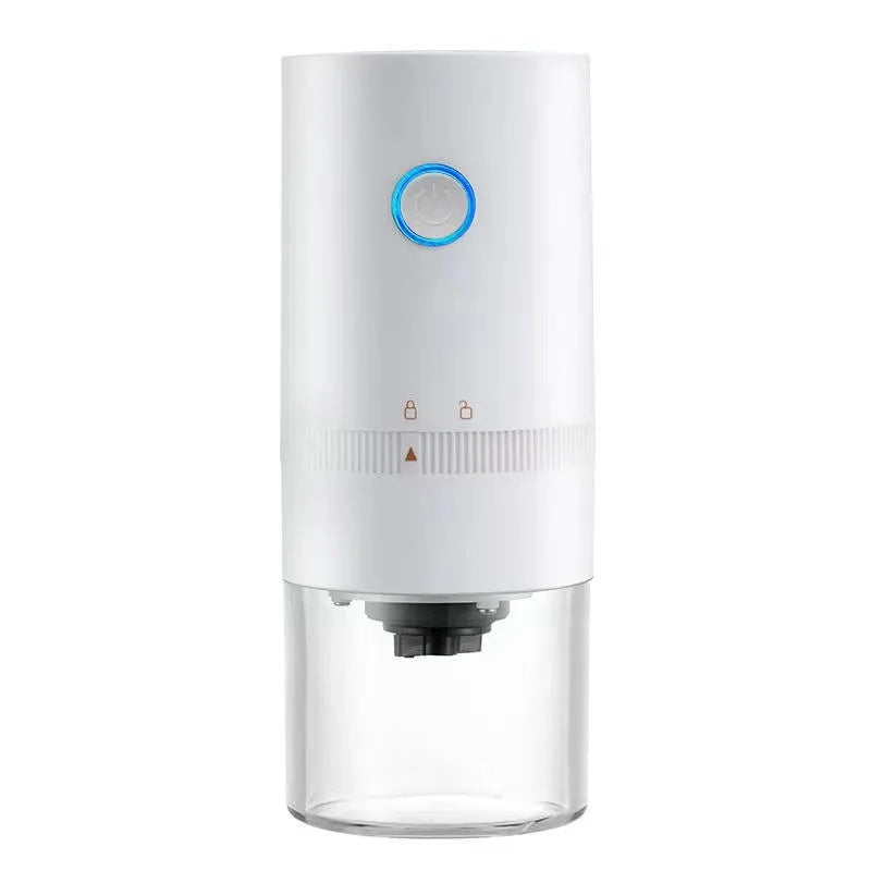 Black and white portable USB-C electric coffee grinder with transparent chamber on a kitchen counter