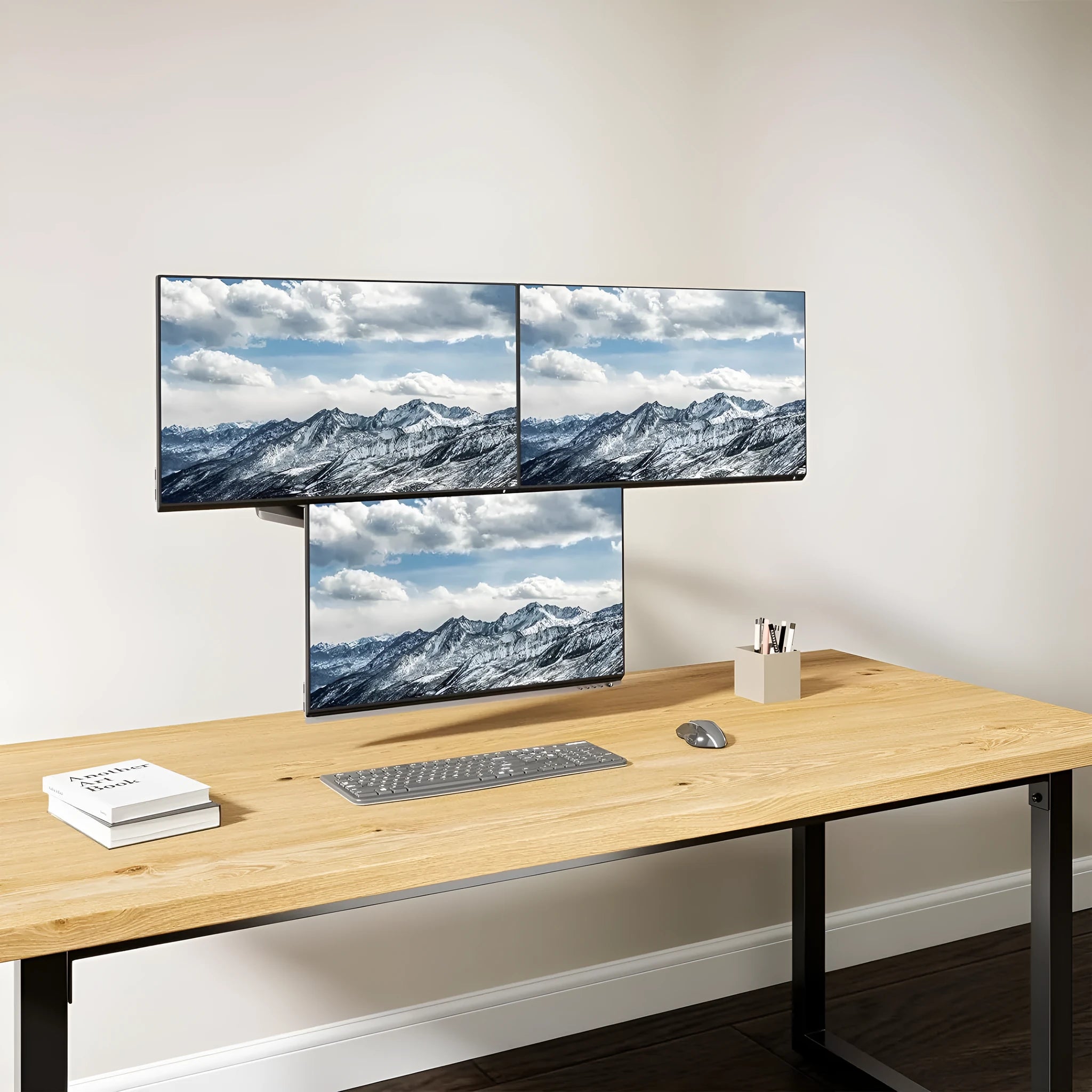 Black three-arm gas spring monitor mounting arm for 13 to 27 inch computer screens