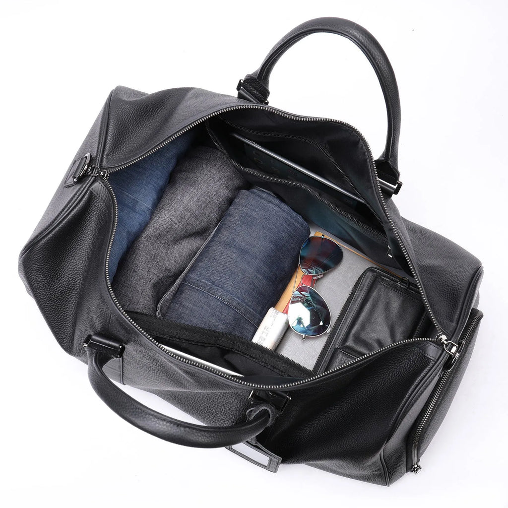 Men's black leather excursion bag with single strap, large capacity below 20L