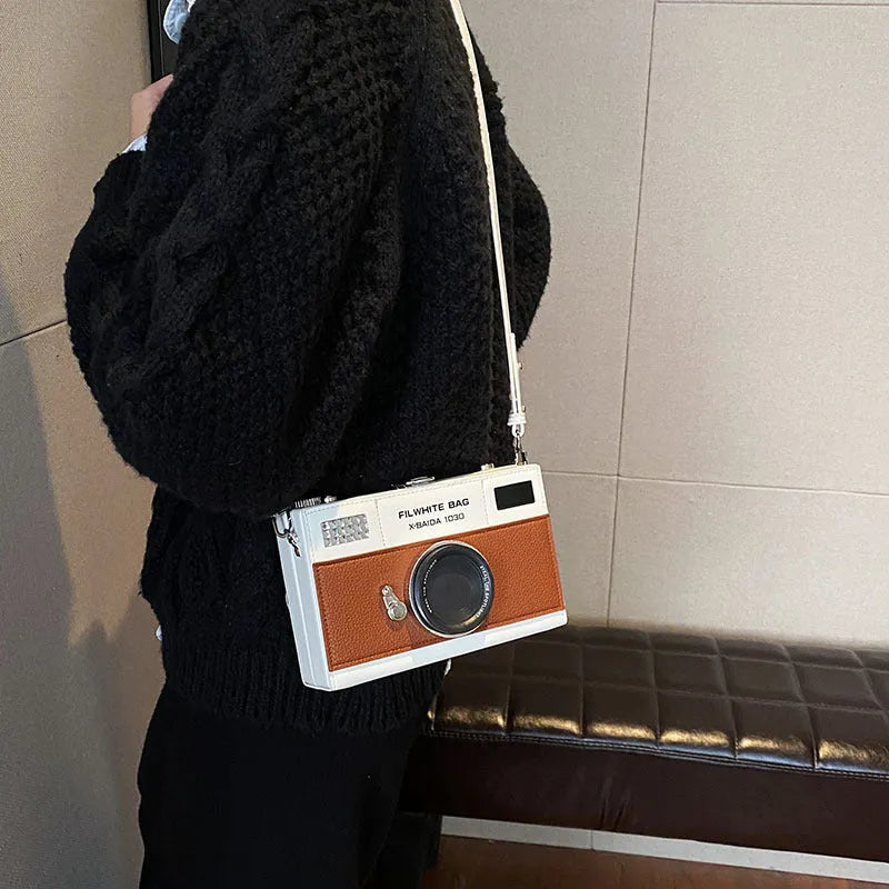 Soft PU mini crossbody camera bag in horizontal square shape with chain strap in black colour