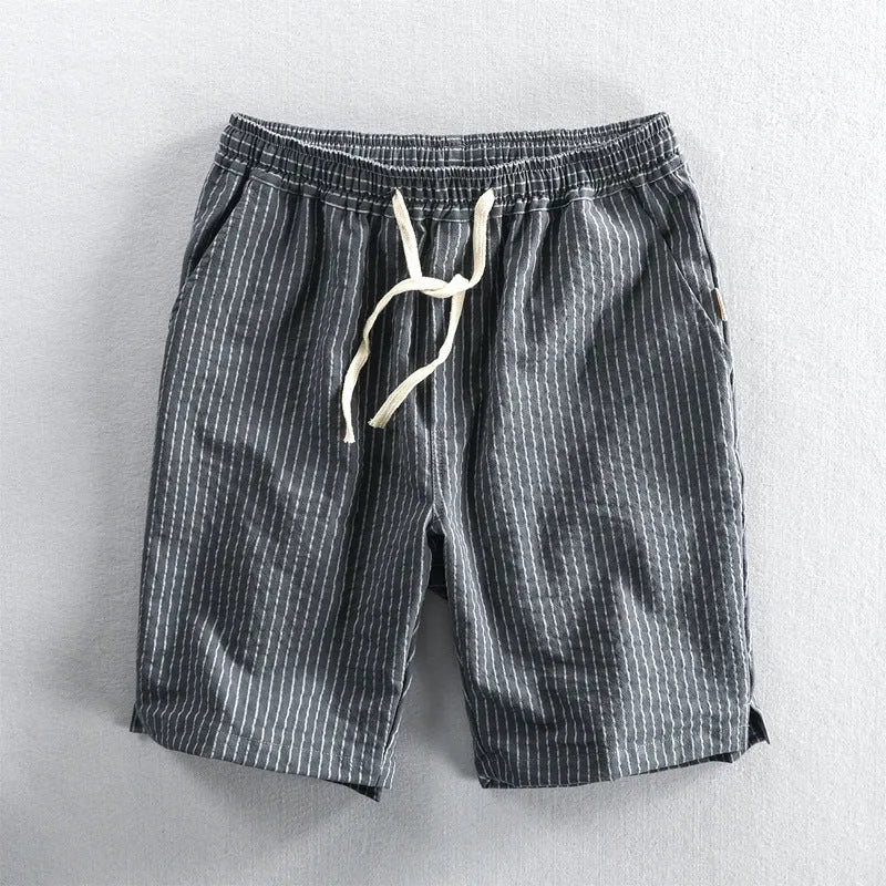 Men's striped cotton casual shorts with an elastic waistband in light blue.