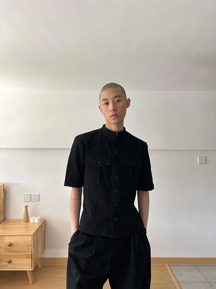 Black loose-fit half-sleeve hunting shirt with a shirt collar and handmade red eye design detail.