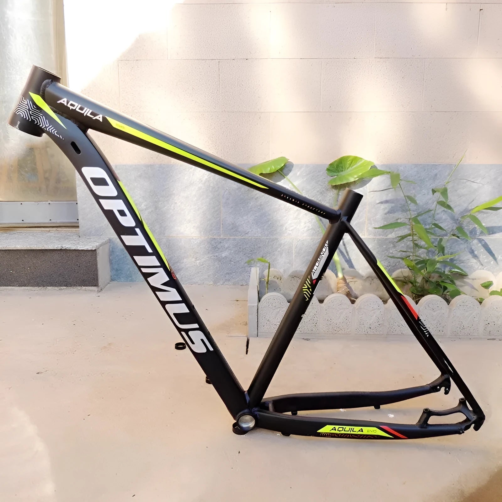 Black green aluminium mountain bike frame for 29-inch wheels with internal cable routing ports