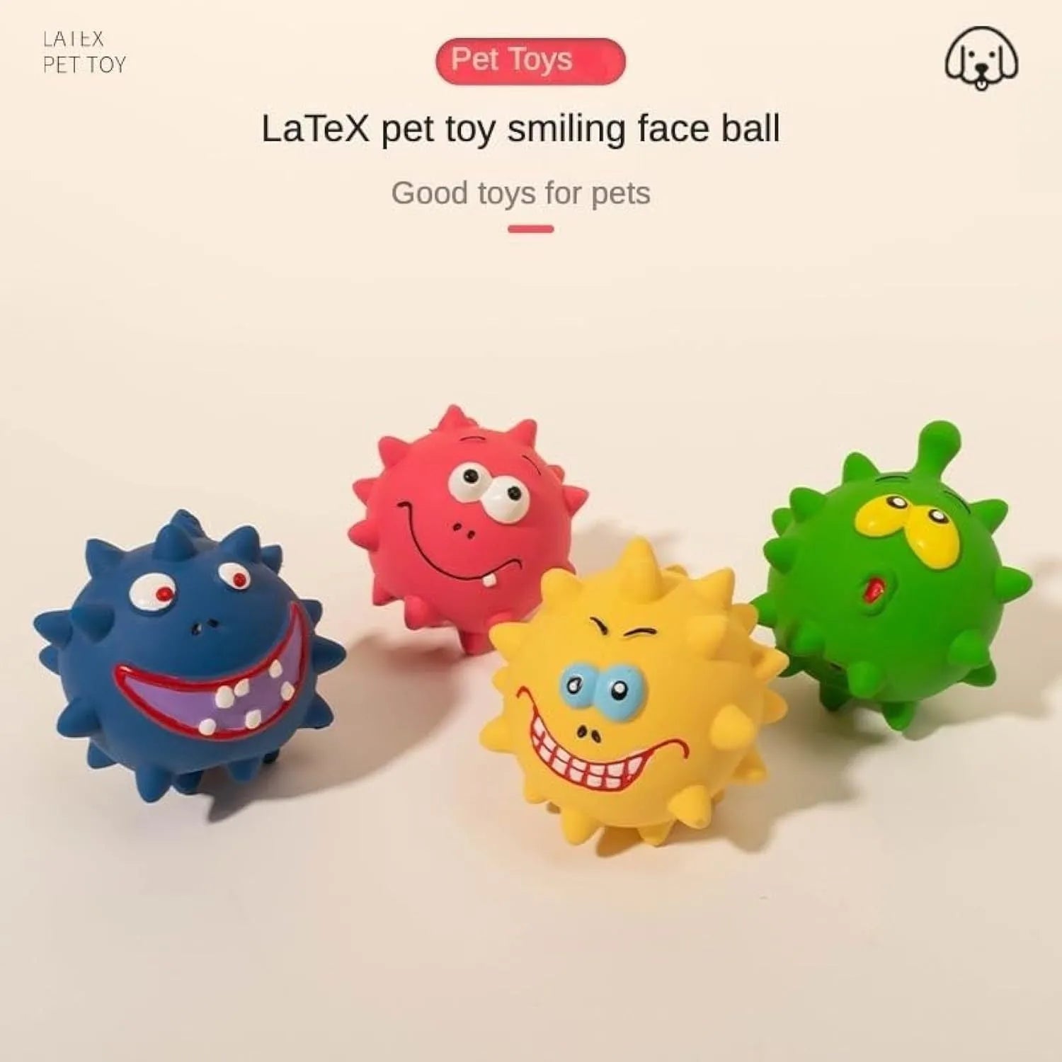 Set of four colourful squeaky dog balls with cute faces, made from natural latex rubber.