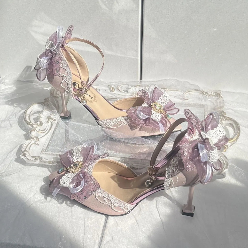 Purple women's flat wedding shoes with satin upper, flower decoration, and a square toe.