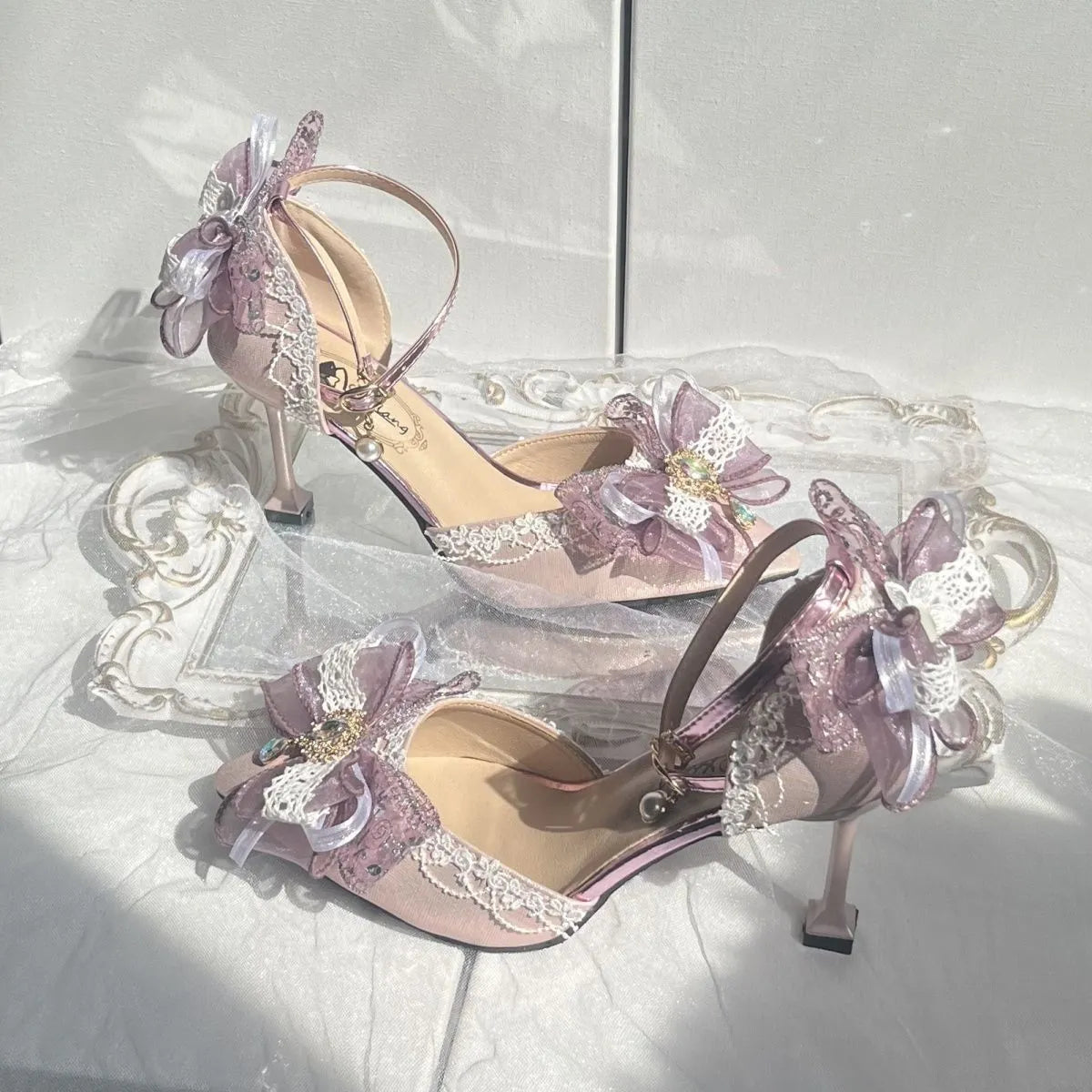 Purple women's flat wedding shoes with satin upper, flower decoration, and a square toe.