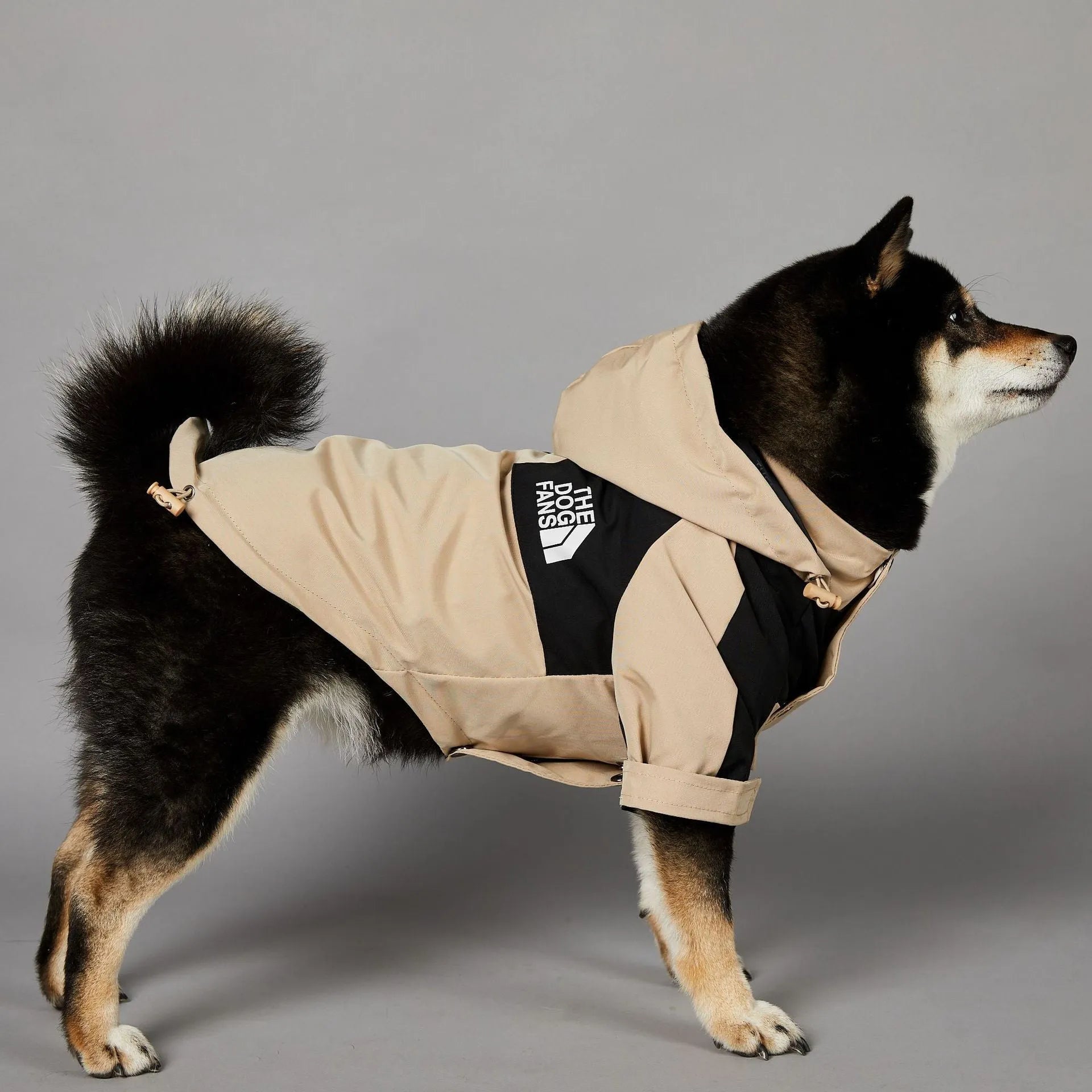 Khaki coloured polyester dog shell jacket laid flat, showing simple coat design for sizes S to 5XL.