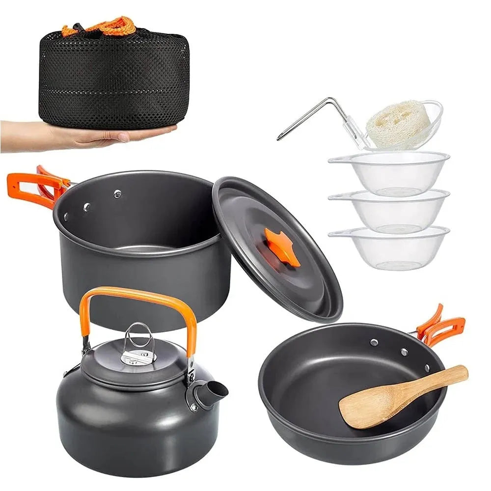 Orange folding camping cookware set with aluminium pot, small pot, frying pan, and food-grade PP bowls arranged on a mesh bag