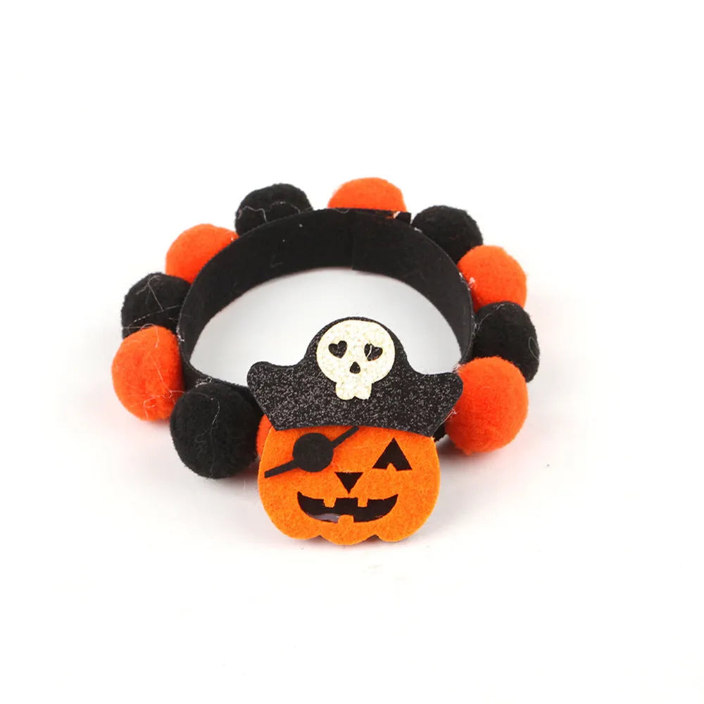 Halloween pet collar with a fur ball decoration in a pumpkin design, shown in size M.