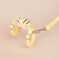 Pink adjustable bee-shaped cat leash with a teddy texture handle for outdoor walks.
