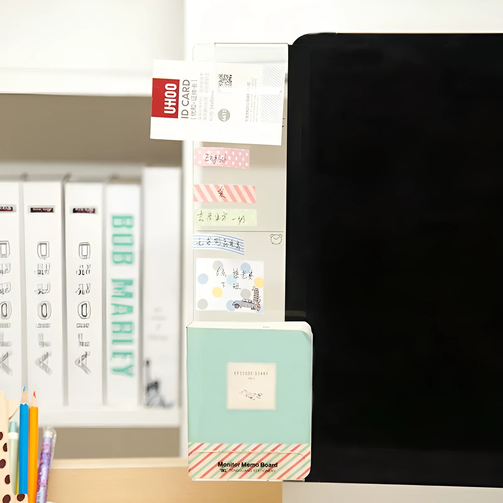 Clear acrylic monitor message memo board with suction mount, showing a post-it note attached, in a modern simple style