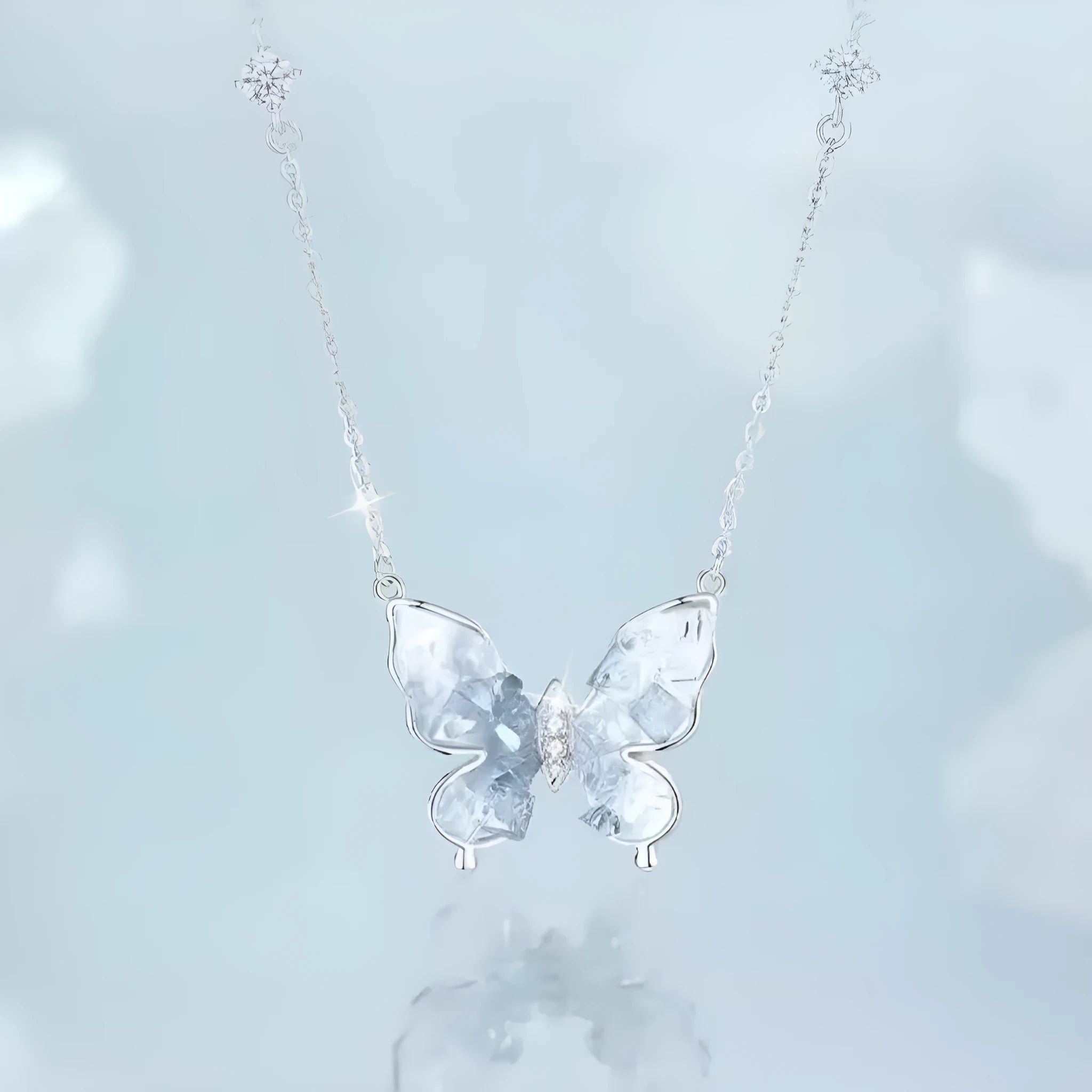 Close-up of an adjustable S925 sterling silver necklace with an ice rain butterfly pendant on a 41-50cm O-ring chain.