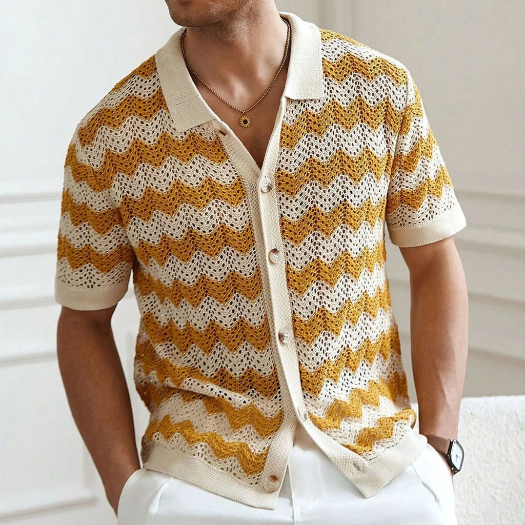 Man wearing a blue short-sleeve corrugated knit sweater with a hollow jacquard pattern, showcasing texture.