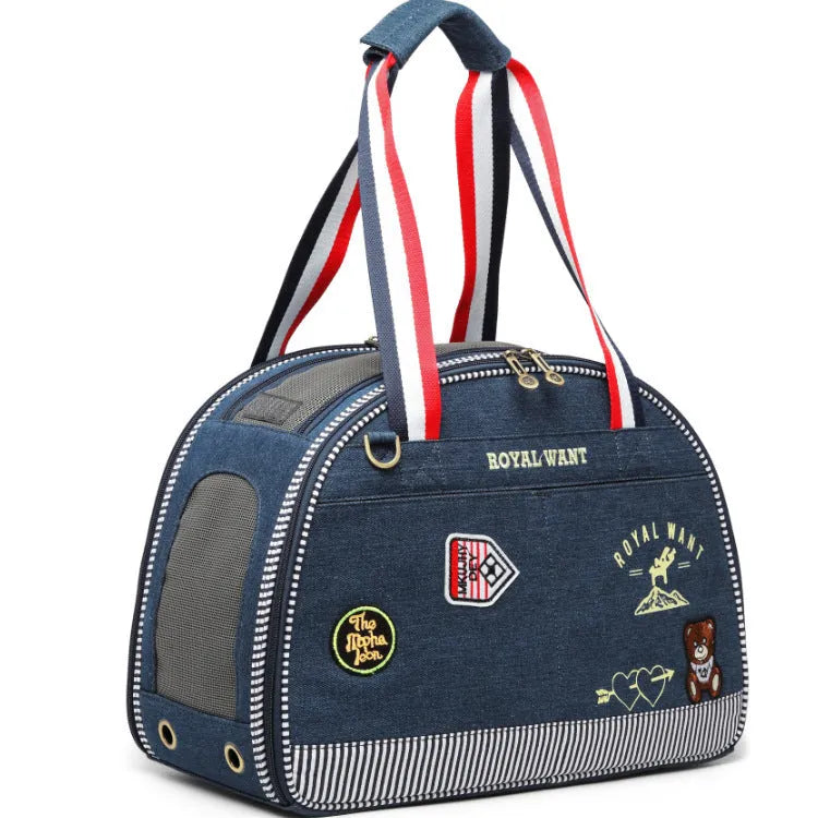 Blue denim pet diaper bag with cartoon pattern, dimensions 43cm by 20cm by 30cm.