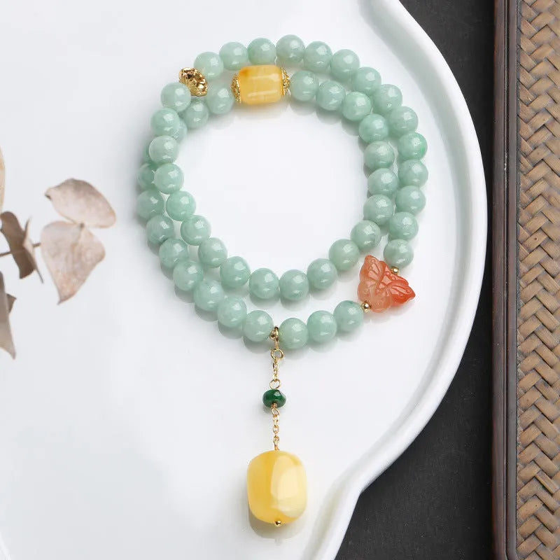 Double-layer women's bracelet with jade round beads and beeswax barrel beads in geometric retro design
