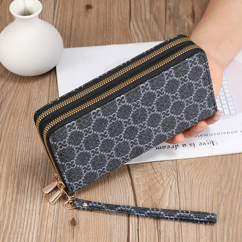 Retro-style long PU leather wallet clutch with printed design showing mobile phone compartment and zipper closure