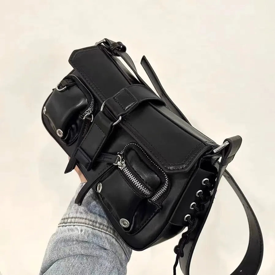 Black PU leather shoulder messenger bag showing adjustable strap and structured form
