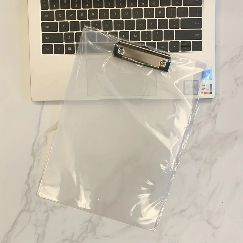 Transparent A4 writing board pad with metal clip holding paper, shown in blue colour option