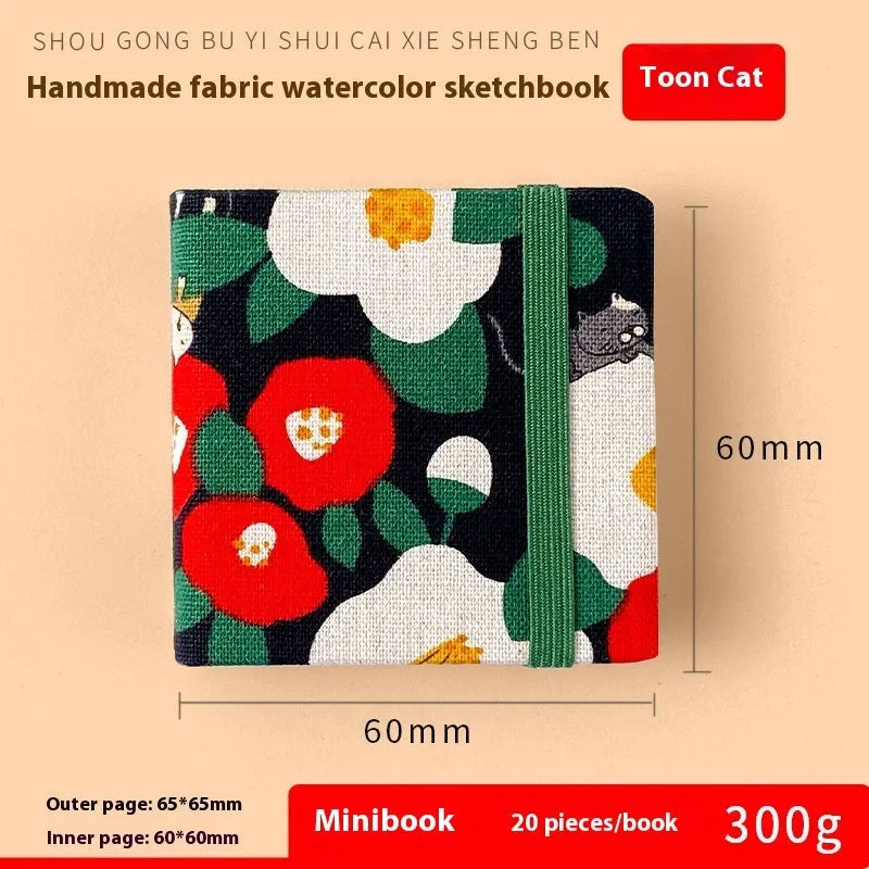 Feiluniao handmade fabric watercolour sketchbook with decorative cover, 185mm long.