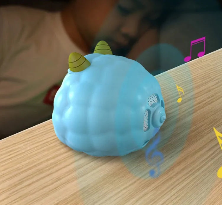 Smart alarm clock with voice control, human body sensor, and luminous dial in silicone white deer style.