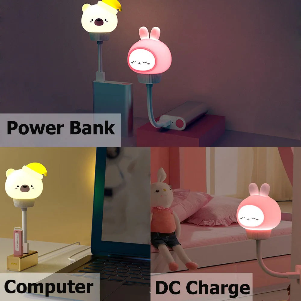 White USB cartoon animal night light in bear design with remote control on wooden table.